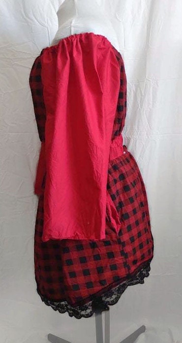 Red plaid top and skirt combo.