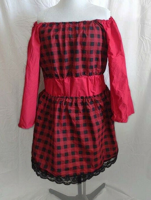 Red plaid top and skirt combo.